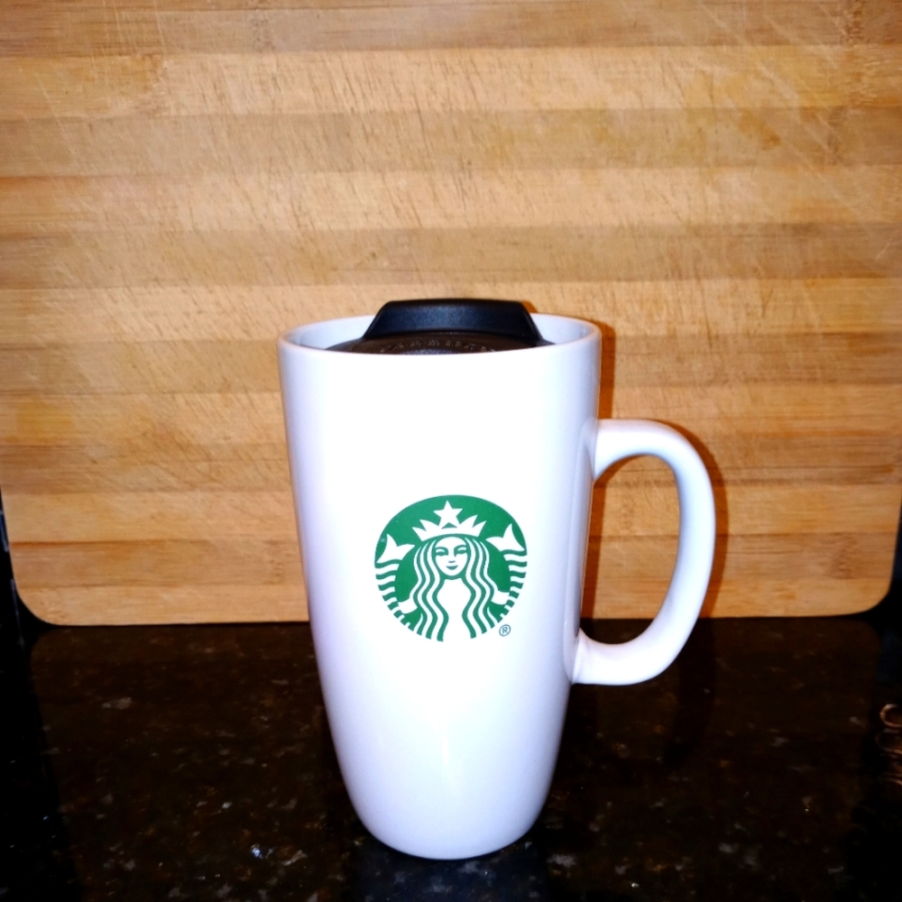 Starbucks glass mug.